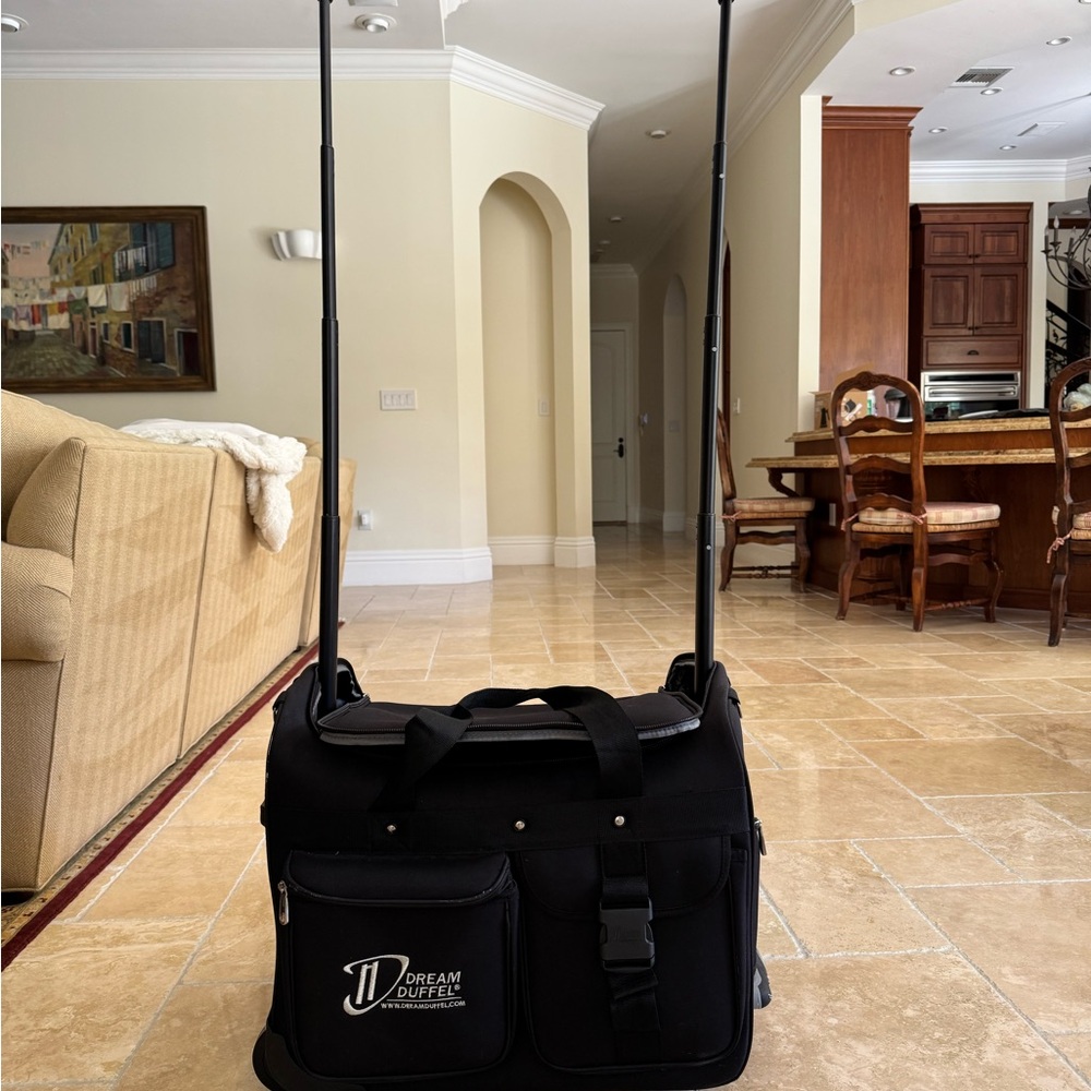 Black Dream Duffel small. Never used and sat in closet
